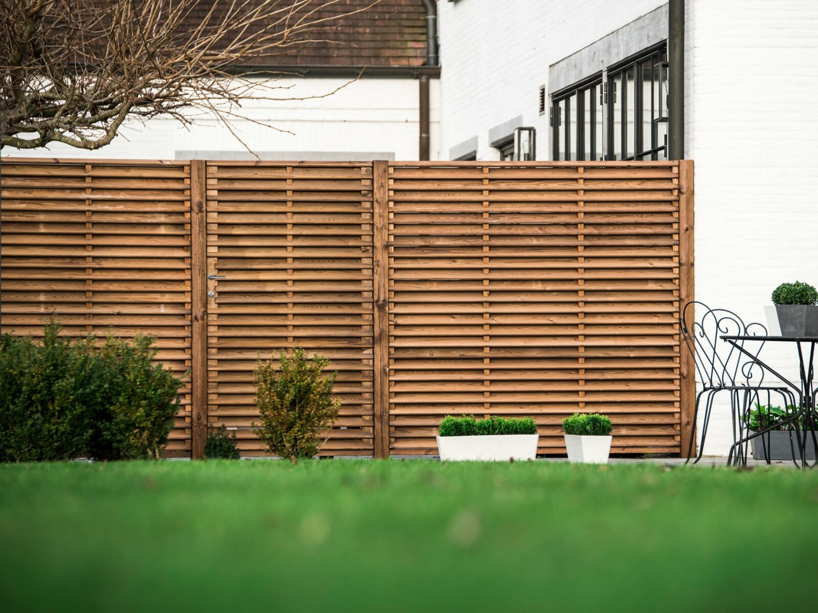 Tuinschermen in kunststof, glas of aluminium Vandenbroucke Hout